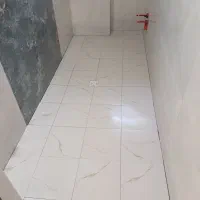 کارگر برای کاشیکاری وبنایی