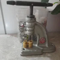 دستگاه پرس دکمه