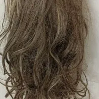 پوستیژ نو و یک عدد مو طبیعی