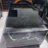 مبل چرم و میز عسلی جلو