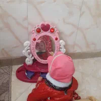 میز ارایش و جغجغه و استند تولد و کتاب حمام