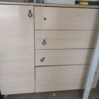 یک عدد دراور، مقداری لوازم تایل