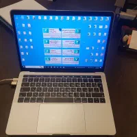 لب تاپ مک بوک ۲۰۱۷ با تاچ بار