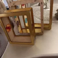 شلف دیواری چوبی طلایی زیبا قیمت ۳۵۰