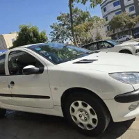 پژو ۲۰۶ تیپ ۲ مدل ۱۳۸۹ سفید(اتوگالری طلایی)