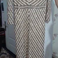 دو عدد پیراهن مجلسی نو  طلایی یک بار استفاده شده