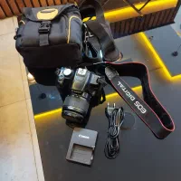 دوربین عکاسی و فیلمبرداری Canon 500D با لنز و کیف