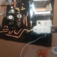 نصب وتعمرات انواع پکیج|آبگرمکن، پکیج، شوفاژ|ارومیه, |دیوار