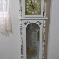 ساعت ایستاده وجاروبرقی