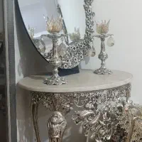 اینه و شمعدان برنجی