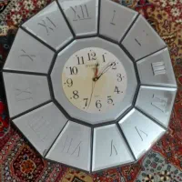 ساعت دیواری آینه ای شیک.کاملا سالم.
