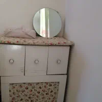 میزاتو و چرخ خیاطی