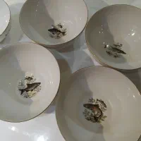 ۴ عدد کاسه پرزلان و دو عددچراغ انتیک