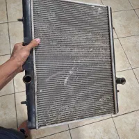 رادیاتور ۲۰۶ ۲۰۷ و منیفولد دود و عایق تیوفایو