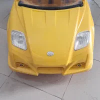 ماشین شارژی زرد