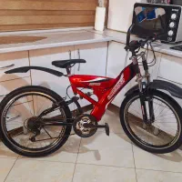 دوچرخه 24 دنده ای کمک فنر دار لاستیک ها نو