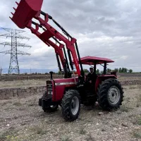 بیل لودری جلو تراکتوری