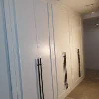 ساخت و تعمیرات کمد و کابینت و درب چوبی