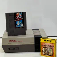 نینتندو با کارتریج و ۱ عدد فیلم آتاری قدیمی