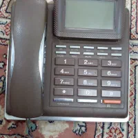 گوشی تلفن رو میزی و گوشی نوکیا ۶۱۱۰