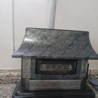 بخاری شومینه وپمپ باد