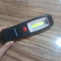 چراغ قوه باطری خور که هم قلاب  واهن ربا برا آویز