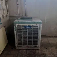 کولر آبی و درب آهنی در آهنی سنگین