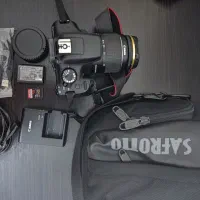 دوربین ۱۳۰۰d کنون + سه پایه + کیف و متعلقات