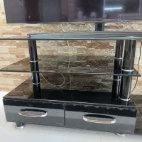 میز تلویزیون تمام شیشه مشکی کارکرده