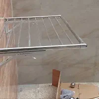 بندرخت تاشودیواری استیل یاسینی