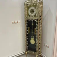 ساعت برنزایستاده