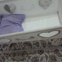 گهواره نوزادی|تخت و صندلی بچه|رباط‌کریم, رباط‌کریم|دیوار