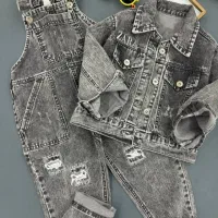 لباس بچه گونه|کفش و لباس بچه|قم, قلعه کامکار|دیوار