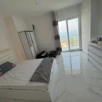 ویو از سالن و اتاق خواب|اجارهٔ کوتاهمدت آپارتمان و سوئیت|کیش, |دیوار