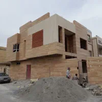 اجرای نمای ساختمان سنگ آجرنما بندکشی با کیفیت