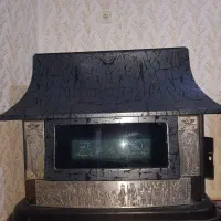 بخاری طرح شومینه در حد نو آک آک قیمت مناسب|بخاری، هیتر، شومینه|صحنه, |دیوار