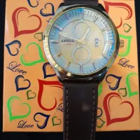 ساعت کلاسیک کهربا شبرنگ