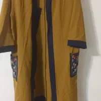 تعدادی مانتو و یدست کت شلوار