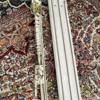 چوب پرده اتوماتیک و پی وی سی