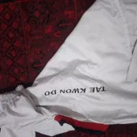 لباس ورزم آوران و تکواندو و هوگو و کمربند|تجهیزات ورزشی|سورک, |دیوار