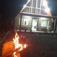 کلبه سویسی پالم|اجارهٔ کوتاهمدت ویلا و باغ|قائمشهر, |دیوار