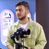 فیلمبرداری عکاس نمایشگاه ساخت تیزر تبلیغاتی صنعتی