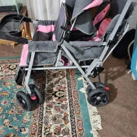 کالسکه دوقولو و سرسره بچه