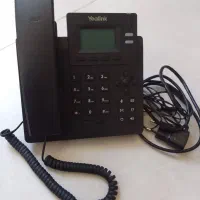گوشی تلفن تحتدوخط شبکه به همراه کابل شبکه وآداپتور