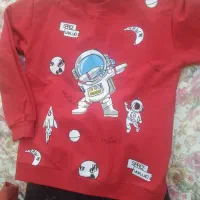 فضانورد با شلوار لی|کفش و لباس بچه|قم, انسجام|دیوار