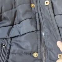 کاپشن|کفش و لباس بچه|قم, قلعه کامکار|دیوار