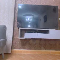 میز تلویزیون طوسی دیواری