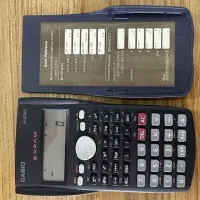 ماشین‌حساب مهندسی و خط کش