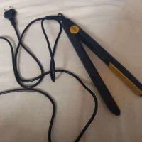 اتوی مو درحدنو بدون ایراد باحرارت خیلی بالا