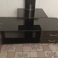 میز زیر تلویزیون شیشه ای